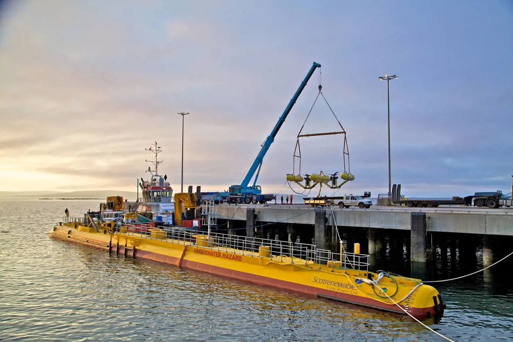 The SR2000 floating tidal energy technology in the water at Haston Pier in Orkney.