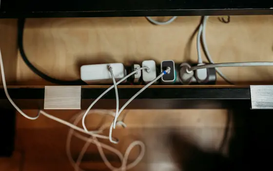 A group of chords plugged in to an adaptor. 