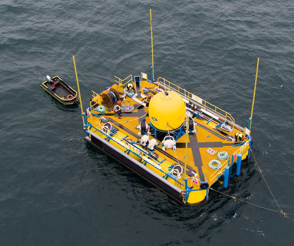An aerial view of the WaveSub platform floating on the surface of the ocean.