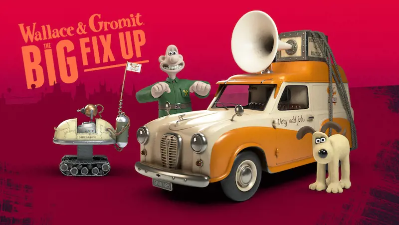 A poster for 'Wallace and Gromit the Big Fix Up' with Gromit the dog in front of an old car, Wallace standing behind it and a robot to the left of them.