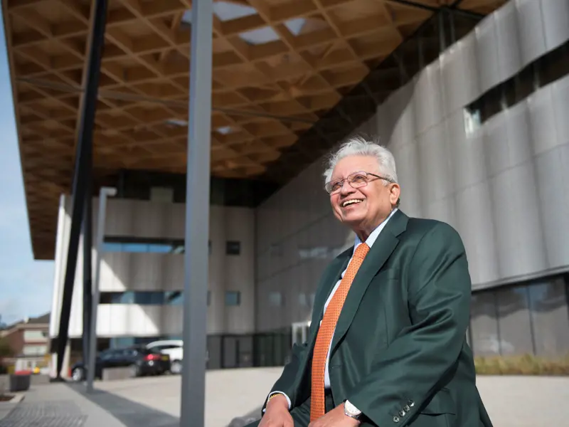 Lord Bhattacharyya outside of the Lord Bhattacharyya Building.