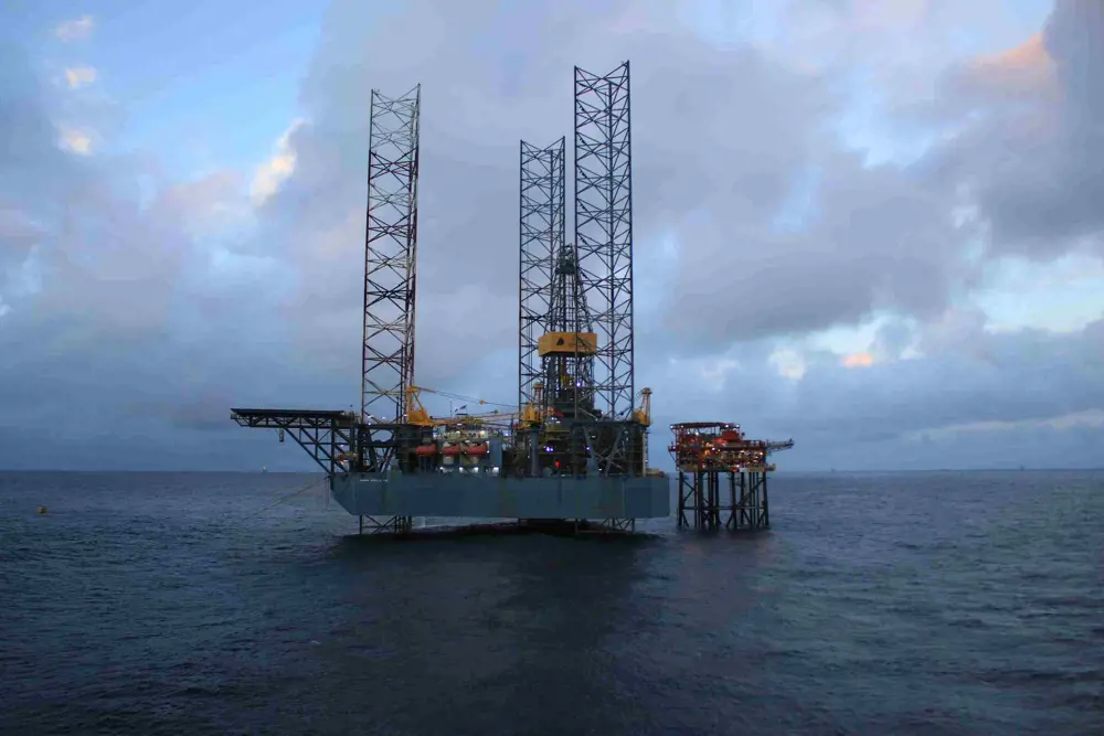 An oil platform in the ocean.