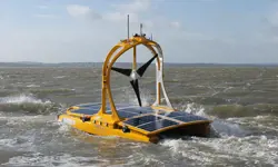 The C-Enduro in the ocean with land in the background.