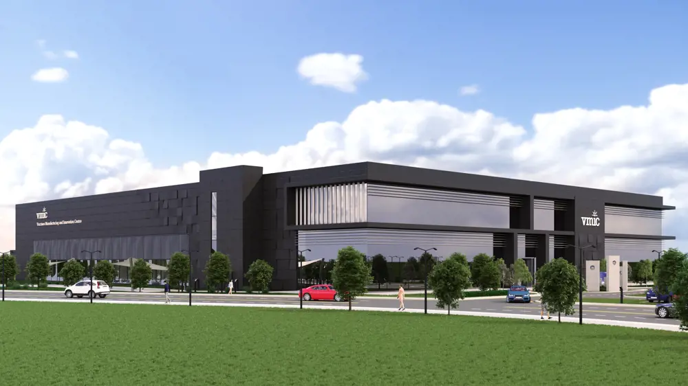 A computer generated depiction of a large vaccine manufacturing and innovation centre with a road and a pathway surrounding the building.