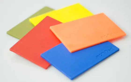 Different coloured rectangular pieces of FORMcard. 