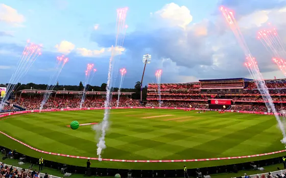 A photograph of a football field with fireworks.