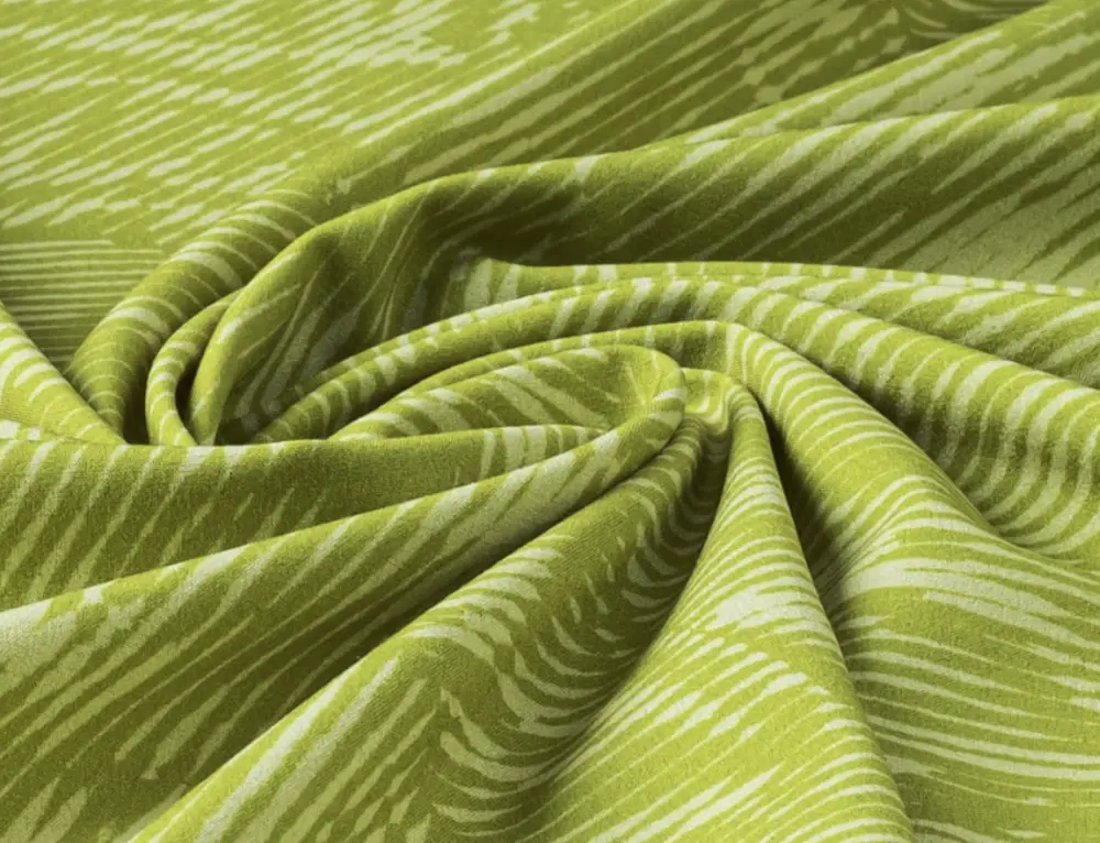 Green patterned fabric scrunched up in the middle.