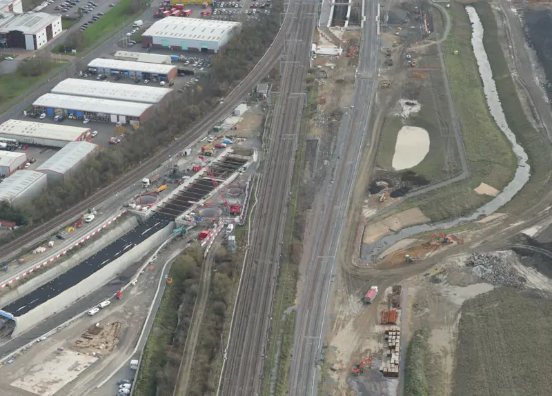 Aerial photograph of different sets of railway tracks running parallel to each other.