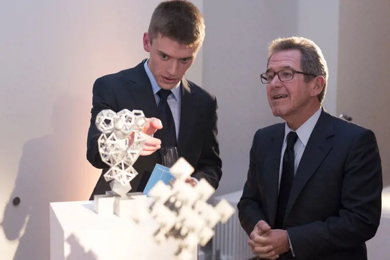 Euan Fairholm and Lord Browne of Madingley FREng FRS with the winning trophy design.