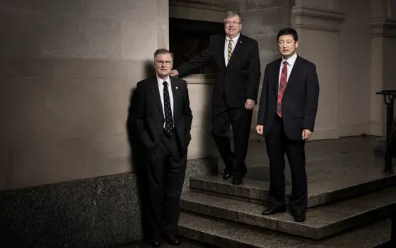 Michael Thompsett, Eric Fossum and Nobukazu Teranishi standing together.