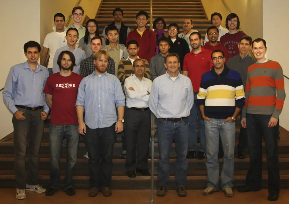 McKeown standing with his computer science group at Stanford University in 2010.