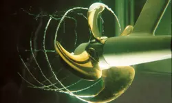 An artistic interpretation of a propeller underwater creating a vortex cavitation.