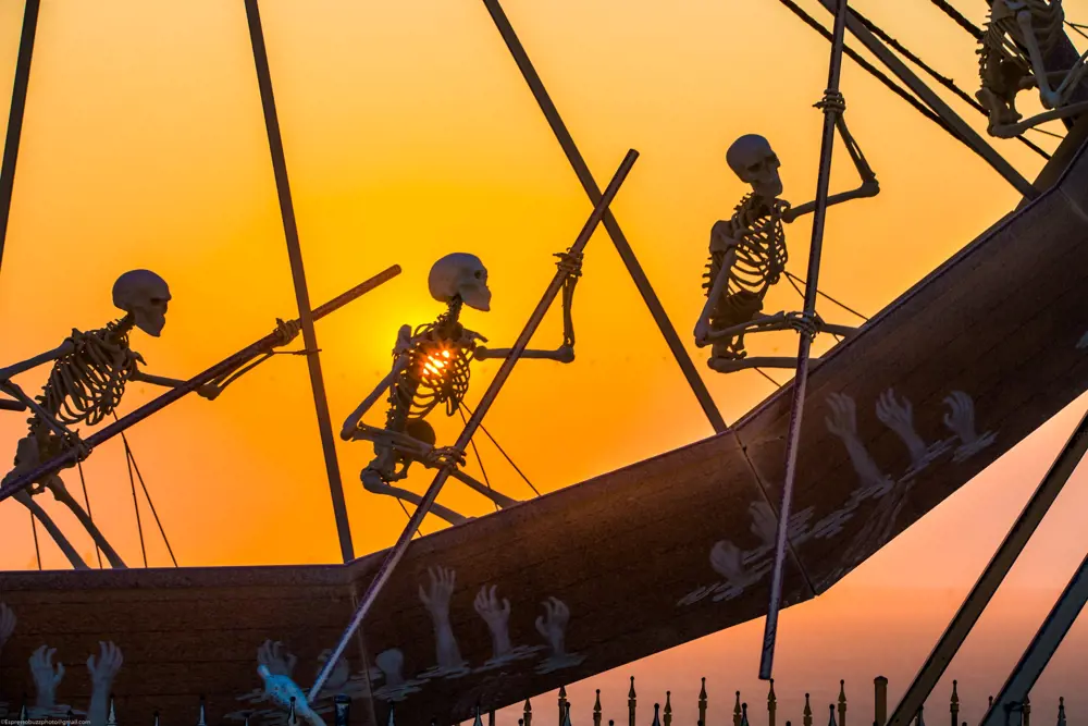 A close up of the model skeletons that appear to row on the Charon giant zoetrope.