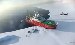 An aerial view of the RRS Sir David Attenborough breaking through ice. People and crates are seen standing on the ice and a helicopter is seen flying above the landing pad on the ship.