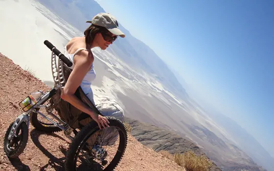 A lady sitting in a Trekinetic wheelchair at Death Valley National Park in California.