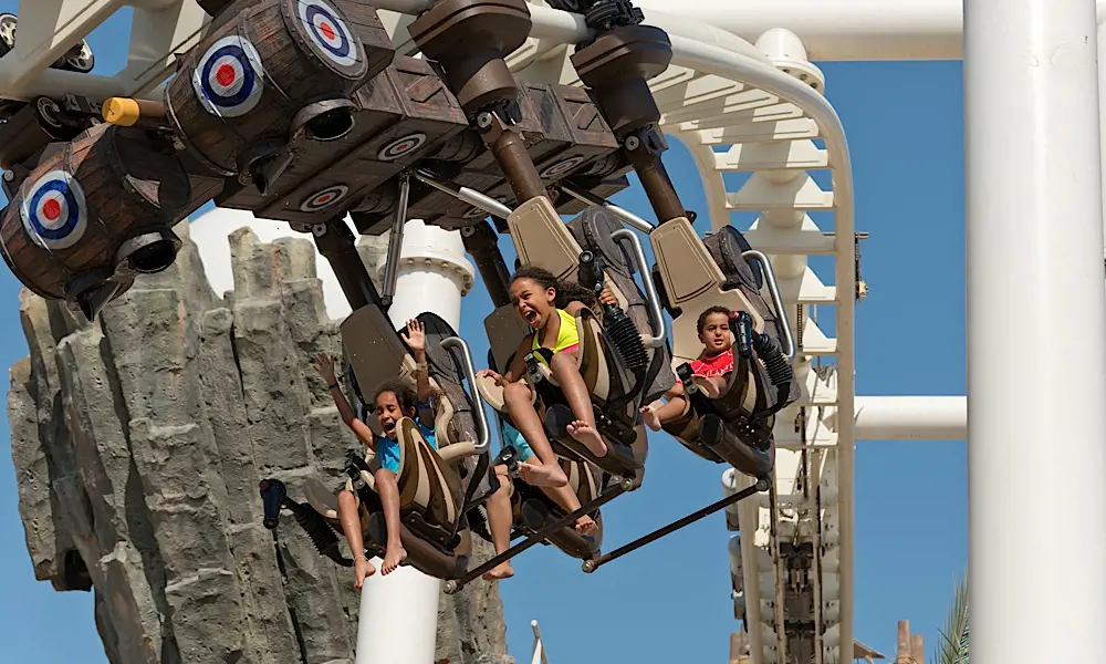 Children on the Bandit Bomber rollercoaster in Abu Dhabi.