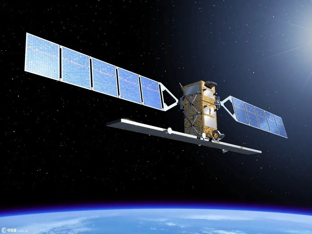A realistic illustration of the sentinel 1 satellite in orbit above the Earth.