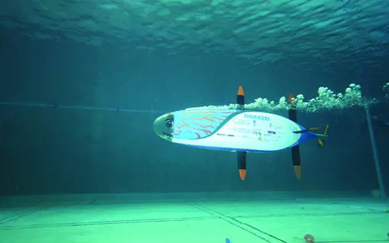 The WASUB 6 submarine in an underwater pool.